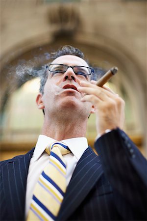 simsearch:700-01015007,k - Businessman with Cigar Stock Photo - Rights-Managed, Code: 700-00795872
