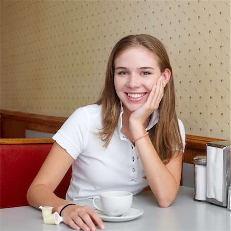 simsearch:700-00561804,k - Portrait of Young Women in Diner with Coffee Cup Stock Photo - Rights-Managed, Code: 700-00819394