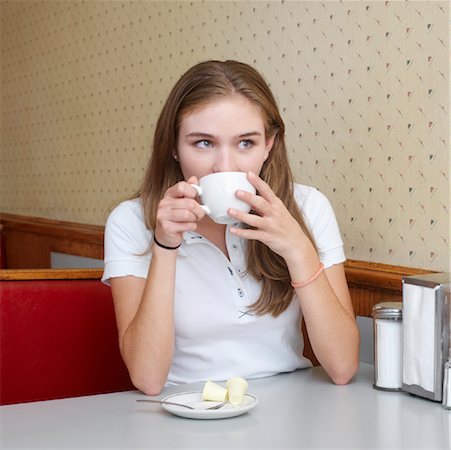simsearch:700-00561804,k - Young Woman Drinking Coffee in Diner Stock Photo - Rights-Managed, Code: 700-00819395