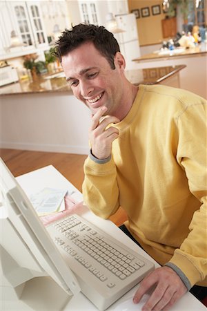simsearch:700-00609240,k - Man Working on Computer Stock Photo - Rights-Managed, Code: 700-00847200