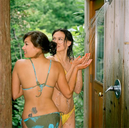 shower with sibling - Women at Outdoor Shower Stock Photo - Rights-Managed, Code: 700-00864941