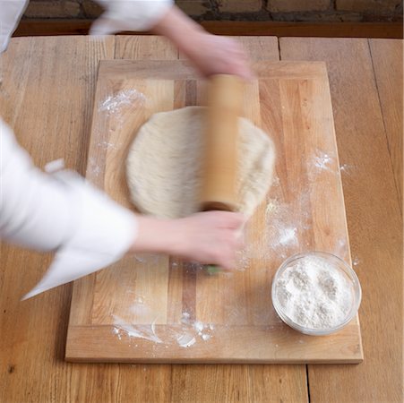 simsearch:649-06845217,k - Woman Rolling Dough Stock Photo - Rights-Managed, Code: 700-00865236