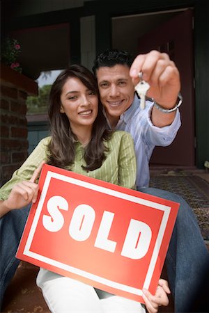 sold sign - Couple with Sold Sign and New Keys to Home Stock Photo - Rights-Managed, Code: 700-00866503