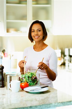 Woman Tossing Salad Stock Photo - Rights-Managed, Code: 700-00897446