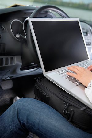 simsearch:700-00609249,k - Woman in Car Typing On Laptop Computer Stock Photo - Rights-Managed, Code: 700-00917691