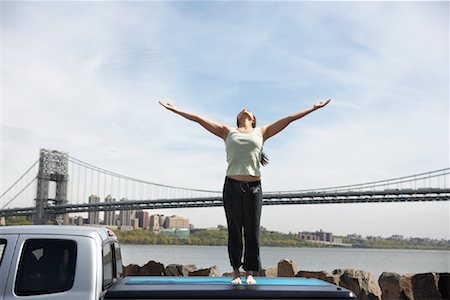 simsearch:700-00377960,k - Woman Standing on Back of Truck Stock Photo - Rights-Managed, Code: 700-00917744