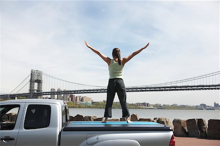 simsearch:700-00377960,k - Woman Standing on Back of Truck Stock Photo - Rights-Managed, Code: 700-00917743