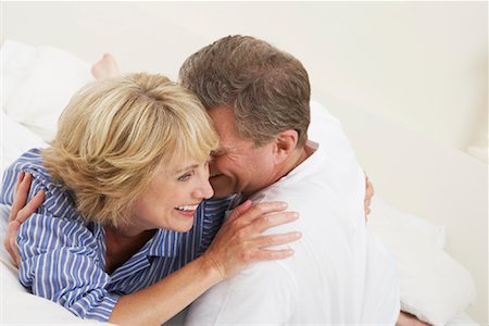 flirt senior woman - Couple Laughing on Bed Stock Photo - Rights-Managed, Code: 700-00918450