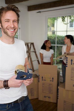 simsearch:700-01109929,k - People Packing Boxes in House Stock Photo - Rights-Managed, Code: 700-00918578