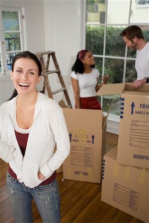 simsearch:700-01109929,k - People Packing Boxes In House Stock Photo - Rights-Managed, Code: 700-00918608