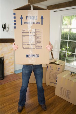 simsearch:700-01109929,k - Man Holding A Big Box Stock Photo - Rights-Managed, Code: 700-00918602