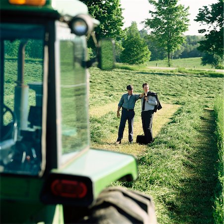 farmer looking into the distance - Farmer and Businessman Looking at Land Stock Photo - Rights-Managed, Code: 700-00910091