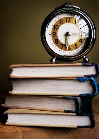simsearch:700-00150473,k - Alarm Clock on Top of Textbooks Stock Photo - Rights-Managed, Code: 700-00911375