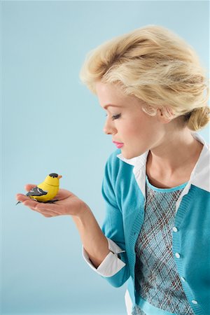 Woman Holding a Bird Stock Photo - Rights-Managed, Code: 700-00912182