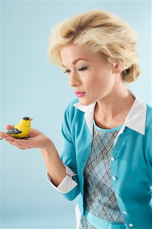 Woman Holding a Bird Stock Photo - Rights-Managed, Code: 700-00912183