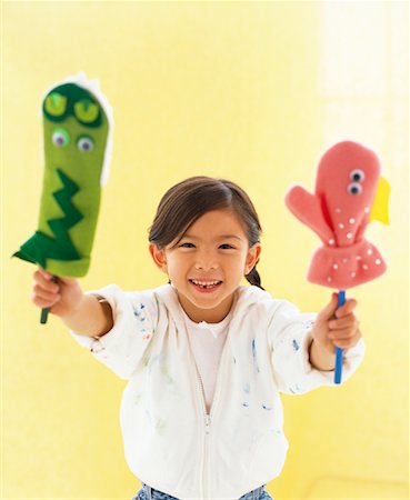 Portrait of Girl with Puppets Stock Photo - Rights-Managed, Code: 700-00934161