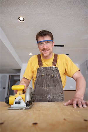 simsearch:700-00404021,k - Man Using Saw Stock Photo - Rights-Managed, Code: 700-00933551