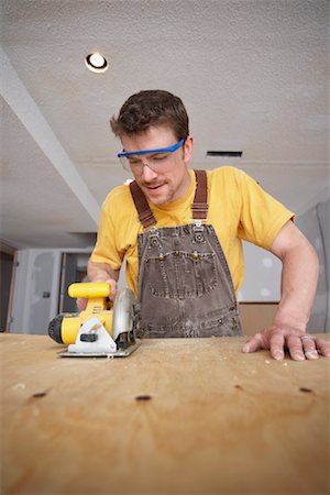 simsearch:700-00918582,k - Man Using Saw Stock Photo - Rights-Managed, Code: 700-00933552