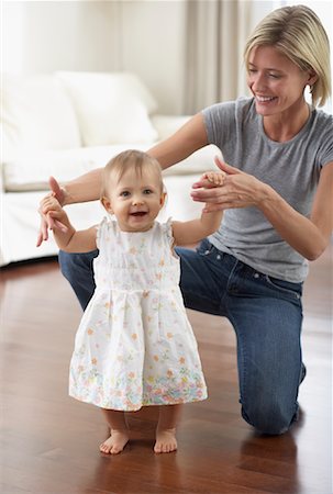 ruffle (gathered pleats) - Baby Taking First Steps Stock Photo - Rights-Managed, Code: 700-00933635
