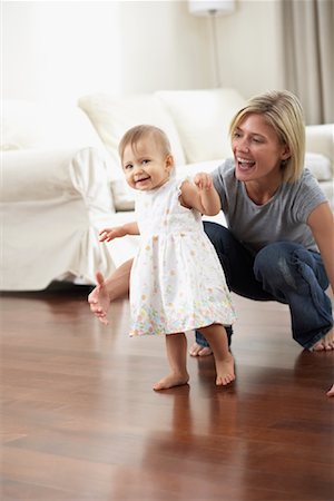 ruffle (gathered pleats) - Baby Taking First Steps Stock Photo - Rights-Managed, Code: 700-00933637