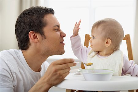 simsearch:700-00078438,k - Father Feeding Daughter Stock Photo - Rights-Managed, Code: 700-00933642