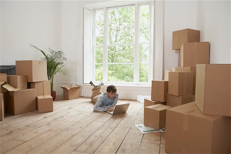 simsearch:700-01109929,k - Man Using Laptop in Room Full of Boxes Stock Photo - Rights-Managed, Code: 700-00933784