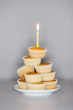 Cupcakes With Birthday Candle Stock Photo - Rights-Managed, Code: 700-00933838