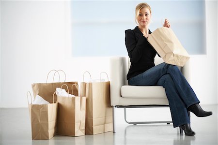 simsearch:700-00768319,k - Portrait of Woman with Shopping Bags Stock Photo - Rights-Managed, Code: 700-00947791