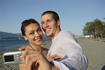 simsearch:700-00529622,k - Couple Taking Picture, Locarno Beach, Vancouver, British Columbia, Canada Stock Photo - Rights-Managed, Code: 700-00955205