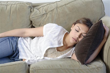 simsearch:700-00522867,k - Woman Sleeping on Sofa Stock Photo - Rights-Managed, Code: 700-00955284