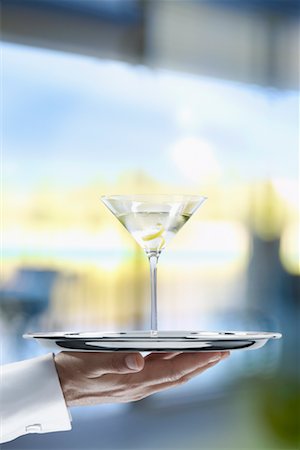 Waiter Carrying Martini on Tray Stock Photo - Rights-Managed, Code: 700-00955624