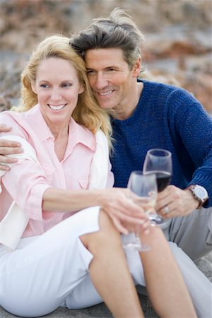 Portrait of Couple Sitting at Beach Stock Photo - Rights-Managed, Code: 700-00983687