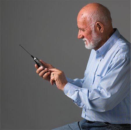 simsearch:700-00284729,k - Man Dialing Cellular Phone Stock Photo - Rights-Managed, Code: 700-01014547