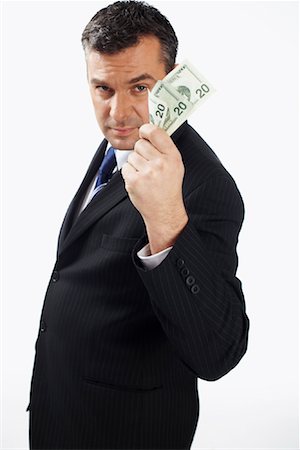 simsearch:700-01015007,k - Businessman Holding Money Stock Photo - Rights-Managed, Code: 700-01014987