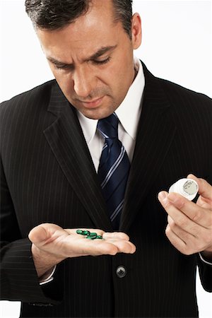 simsearch:700-01015007,k - Businessman with Medicine Stock Photo - Rights-Managed, Code: 700-01014993