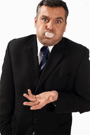 simsearch:700-01015007,k - Businessman Chewing Bubblegum Stock Photo - Rights-Managed, Code: 700-01015017