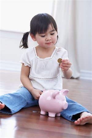 ruffle (gathered pleats) - Little Girl with Piggy Bank Stock Photo - Rights-Managed, Code: 700-01029701
