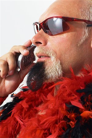 eccentric white background - Man Talking on Cellular Phone Stock Photo - Rights-Managed, Code: 700-01037664