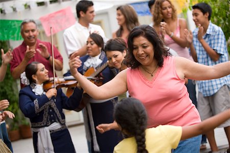 senior obese fat woman image - Woman and Girl Dancing at Family Gathering Stock Photo - Rights-Managed, Code: 700-01041299