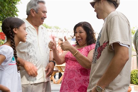 simsearch:700-01234773,k - Grandparents with Grandchildren at Family Gathering Stock Photo - Rights-Managed, Code: 700-01041301