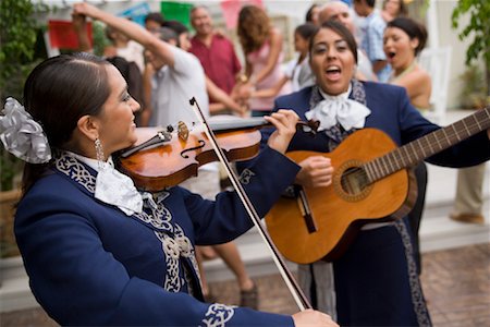 Mariachi Musicians at Family Gathering Stock Photo - Rights-Managed, Code: 700-01041310