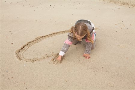 simsearch:700-01042733,k - Girl Drawing in Sand Stock Photo - Rights-Managed, Code: 700-01042702