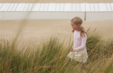 Girl in Long Grass on Beach Stock Photo - Rights-Managed, Code: 700-01042745