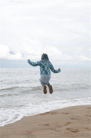 simsearch:700-01042880,k - Girl Jumping in Surf on Beach Stock Photo - Rights-Managed, Code: 700-01042764