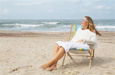 simsearch:700-00085279,k - Portrait of Woman Sitting in Canvas, Beach Chair, on Beach Stock Photo - Rights-Managed, Code: 700-01042842