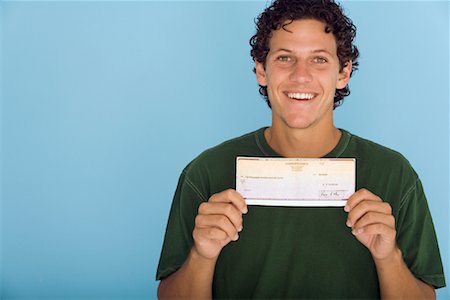 Portrait of Man Holding Cheque Stock Photo - Rights-Managed, Code: 700-01072308