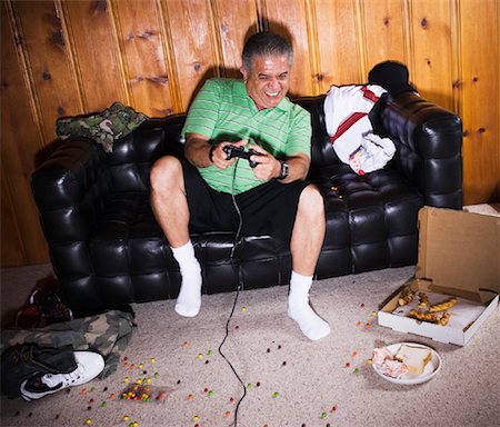 Man Playing Video Games Stock Photo - Rights-Managed, Code: 700-01072461