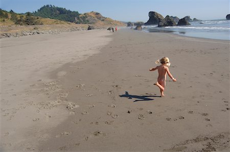 Girl Running at the Beach, Oregon USA Stock Photo - Rights-Managed, Code: 700-01072527