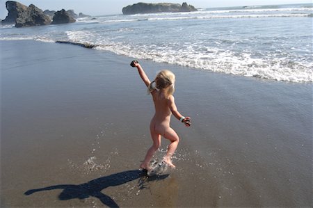 Girl Running at the Beach, Oregon USA Stock Photo - Rights-Managed, Code: 700-01072528