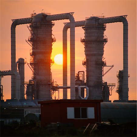 pollution sun - Refinery Towers at Dusk Stock Photo - Rights-Managed, Code: 700-01072709